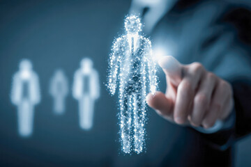 Businessman hand selecting holographic digital human figure representing recruitment or talent acquisition with futuristic technology and network connections background