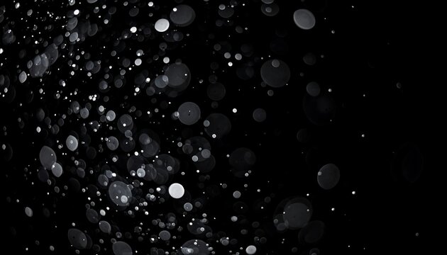 Abstract bokeh effect, light particles on dark background