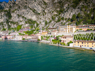 Garda lake panoramic view. Aerial view of lake Garda and Limone sul Garda surroundings. Lombardy drone landscape