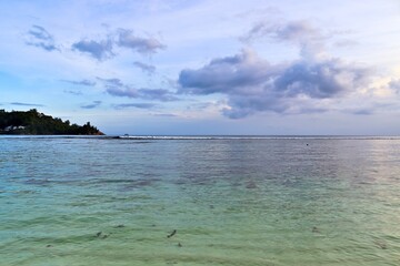 Seychelles Islands tropical sea water and clouds