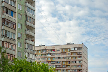 Soviet Residential Apartment Block with Cloudy Sky