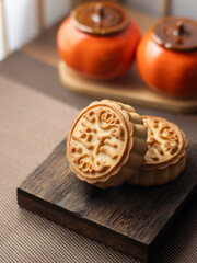 Go home to eat mooncakes during the Mid-Autumn Festival.