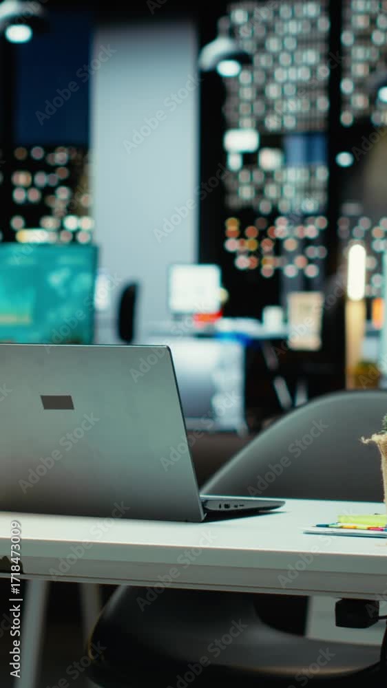 Poster vertical video modern empty office glows with the light of performance metrics and forecasting graph