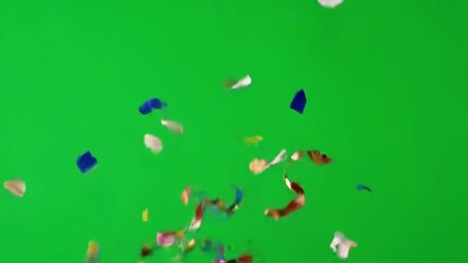 Celebratory Confetti and Streamers Falling on Green Screen Background for festive occasions, perfect for video intros, overlays and greetings
