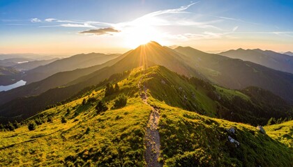 Scenic Aerial View of Green Mountains with Golden Sunlight at Dawn