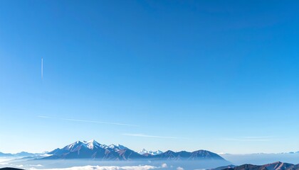 Obraz premium Panoramic mountain vista with clear sky