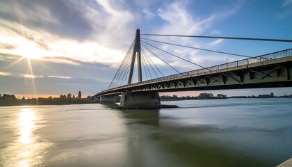 Obraz premium Sunset over a cable-stayed bridge