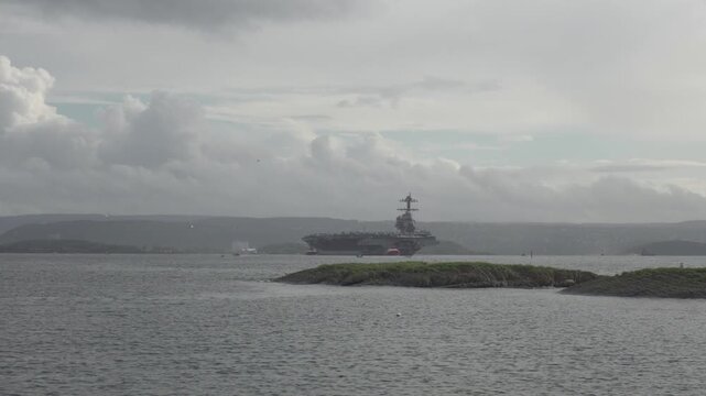 USS Gerald R. Ford Aircraft Carrier, Lead Ship Arriving In The Coast Of Oslo In Norway. - wide shot