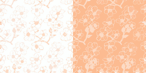 Delicate peach blossom branches pattern on white and peach background