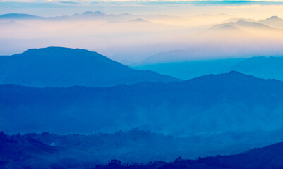 mountains in the fog