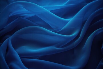 Obraz premium Elegant blue silk fabric drapes in soft, flowing waves and curves