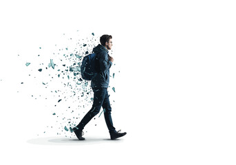 Fototapeta premium Walking Man Dissolving into Fragments with Backpack and Glasses.
