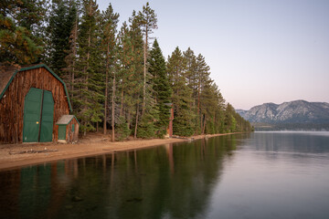 Sunrise over South Lake Tahoe, calm waters andboats