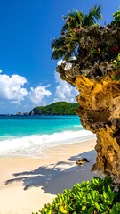 Tropical beach scene with rocky outcrop