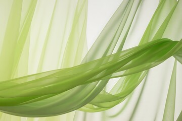 Flowing green sheer fabric creating soft waves and folds against a light background
