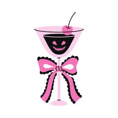 Halloween Cherry Cocktail with Bow. Spooky Pink Martini Glass Drink with curly ribbon scary pumpkin face