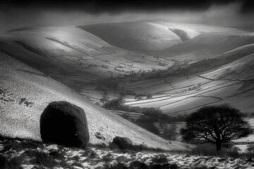 Snowy valley, sunlit slopes, dramatic hills