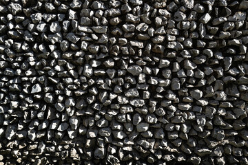 Old stone background. Ancient stone wall pattern background. Rustic old stone surface for design. Old masonry stone background in close-up.