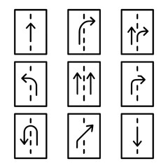Nine Black and White Road Directional Arrows on Rectangular Signs.