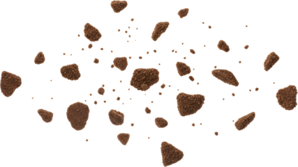 Scattered chocolate cookie crumbs and small pieces floating mid air isolate Food Brown Sweet Biscuit