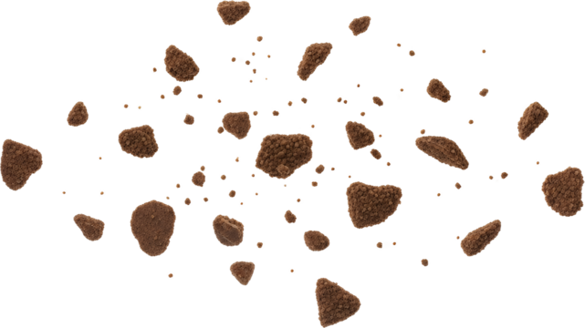 Scattered chocolate cookie crumbs and small pieces floating mid air isolate Food Brown Sweet Biscuit