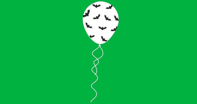 White balloon floating on transparent background, enhancing party planning with bat pattern ribbon