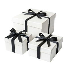 Obraz premium Elegant white gift boxes with black ribbons stacked together create festive atmosphere perfect for celebrations