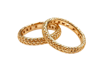 Ornate gold bangles intertwined isolated on transparent background. Golden wedding rings isolated on white background.