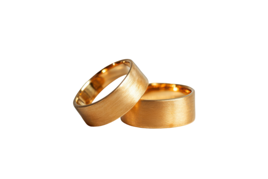 Textured gold wedding rings isolated on transparent background. Golden wedding rings isolated on white background.