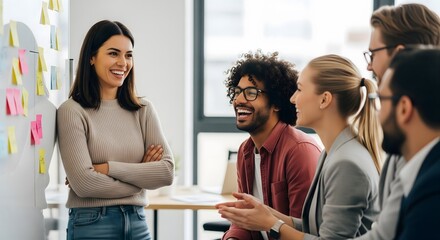 Side view of a cheerful quartet of professionals in a stylish urban office 01