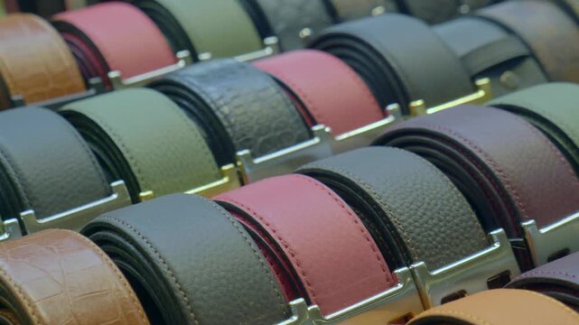 Stylish belts on display at a local market