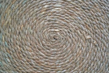 Braided rope coiled into a circular form