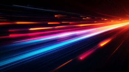 Abstract streaks of vibrant blue and orange light trails against a dark background