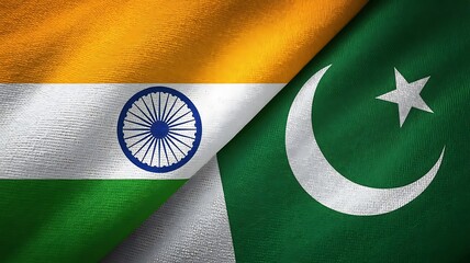 A close up of the flags of india and pakistan overlapping each other in the image