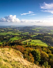 Obraz premium Panoramic view of a valley with autumnal colors