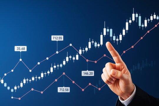 Business hand pointing at rising stock market candlestick chart with price data points on blue background illustrating financial growth concept. - Powered by Adobe