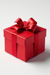 Obraz premium Elegant red gift box, bow, pristine white background, texture, ribbon, bright