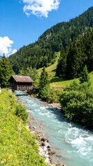Fototapeta premium Mountain stream flows through a valley