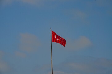 Turkish flag against a blue sky