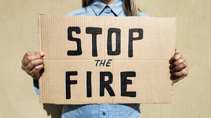 People protest against war in the city - Demonstrators fighting for freedom and peace holding banners outdoor