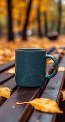 Speckled Teal Mug on Park Bench Amidst Golden Autumn Leaves