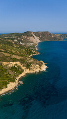 Paralia Dafni Beach Zakynthos Greece aerial view of sandy shoreline with turquoise Ionian Sea and dramatic coastal cliffs