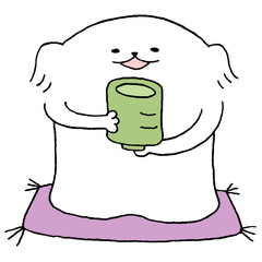 座布団に座りお茶を飲む犬