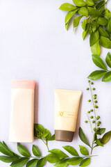 sunscreen spf50 for health care skin face with body lotion of lifestyle woman relax arrangement flat lay style on background white