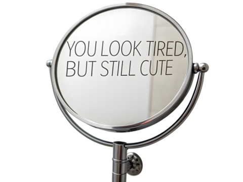 Mirror reflects "you look tired, but still cute" message, perfect for relatable content and self-care,isolated on white background