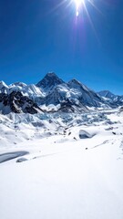 Obraz premium Snowy mountain range under a vibrant blue sky