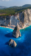 Coastline of Myzithres Zakynthos Greece aerial view with white cliffs turquoise bays iconic rocks and sandy coves along deep blue Ionian Sea