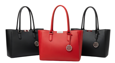 Three tote bags are displayed against a white background, two in black and one in red, all with handles and a circular logo.