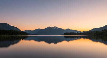 Fototapeta premium Serene Sunrise Over Mountain Lake — Mirror-Like Reflections in Quiet Waters
