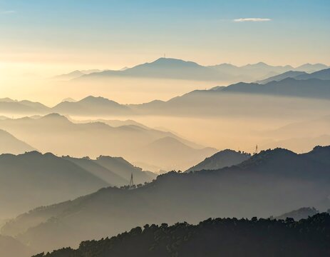 Misty mountain range at sunrise - Powered by Adobe